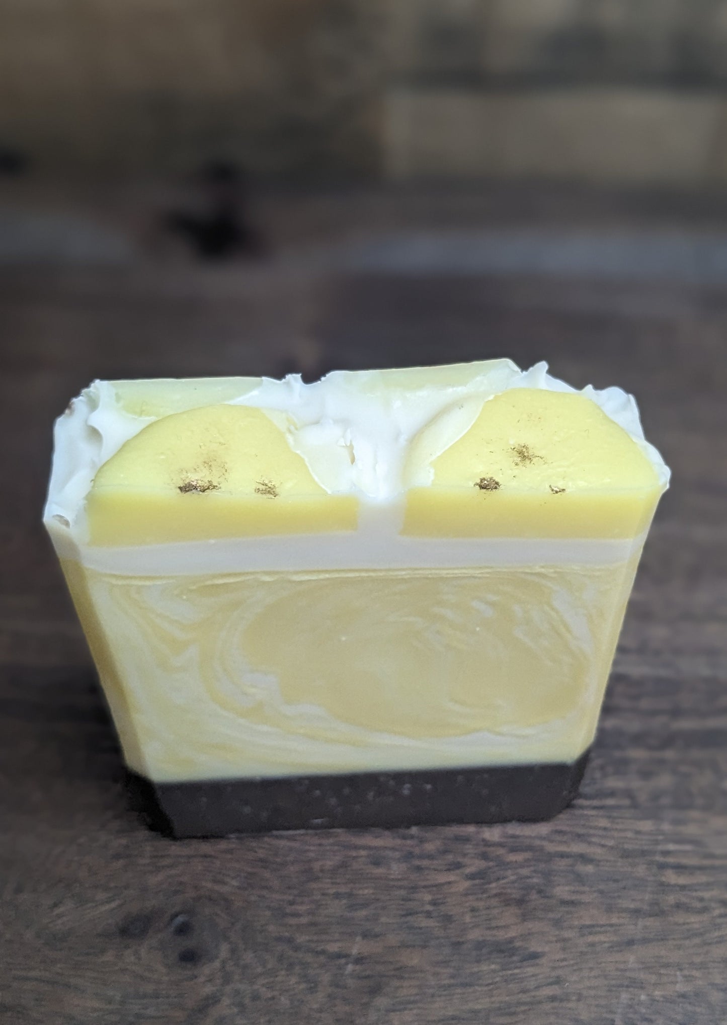 A bar of soap that looks like a slice of banana cream pie