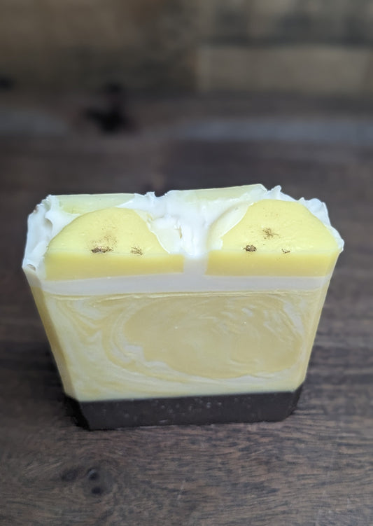 A bar of soap that looks like a slice of banana cream pie